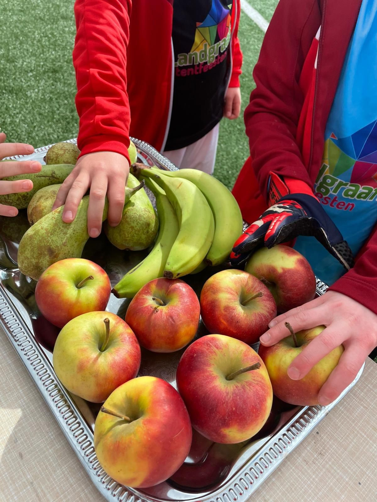 UOW'02 bedankt PLUS Wetzels